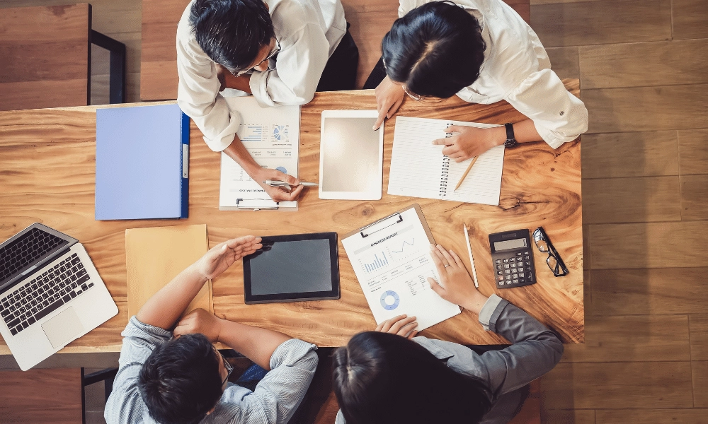 People working on a new business report