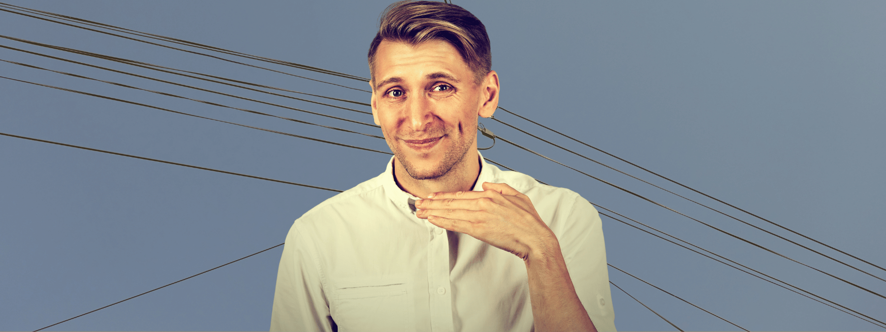 Man in front of telephone wires