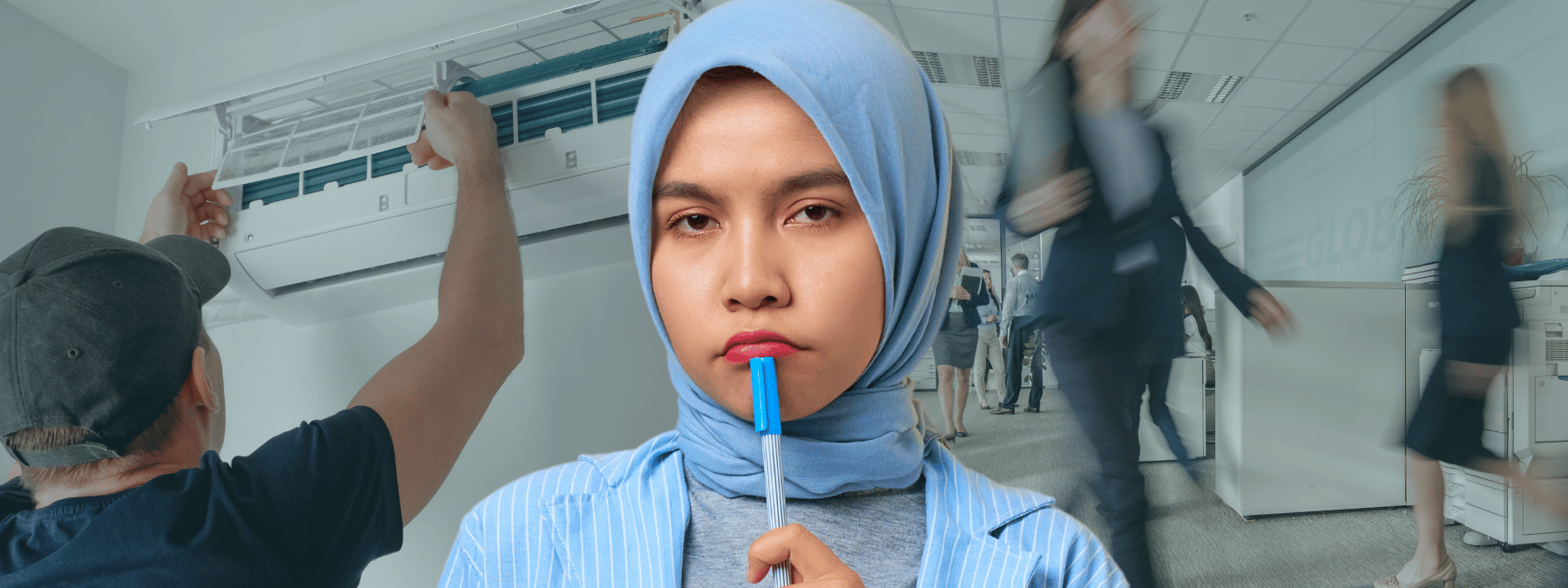 Woman holding pen against chin